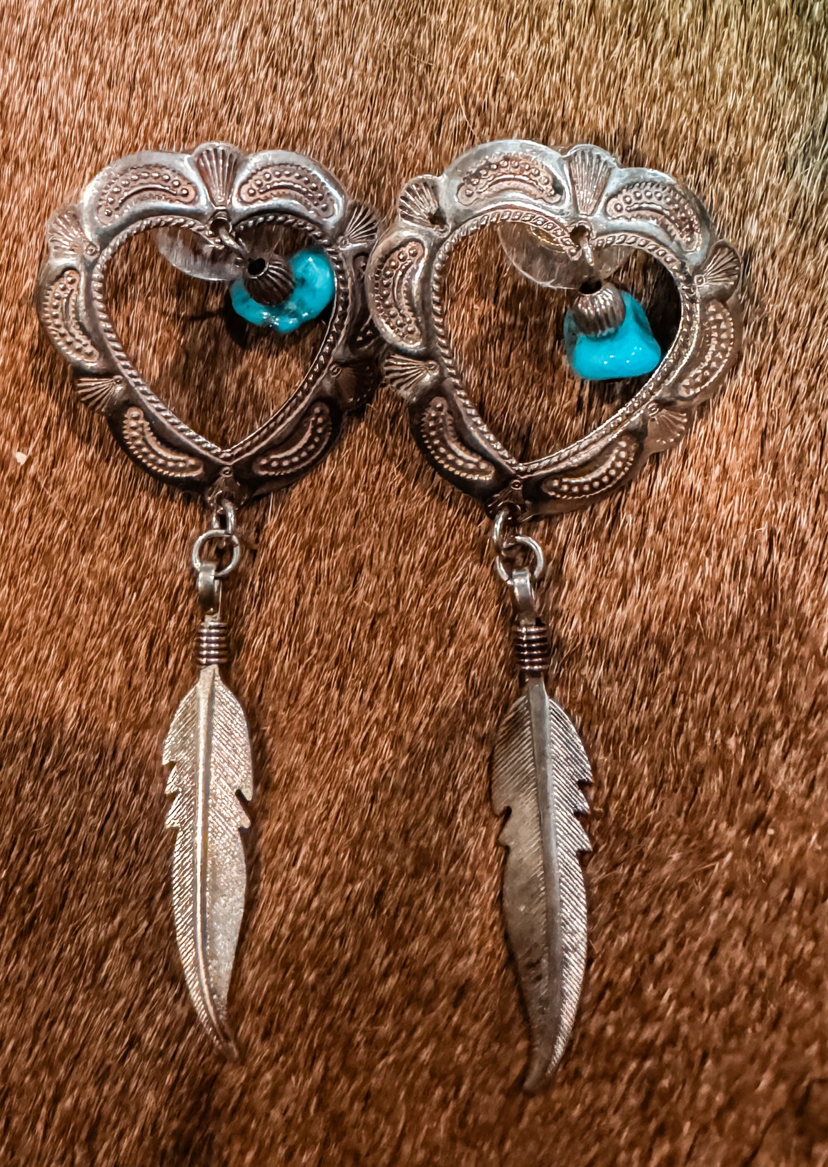 Q.T stamped hart earrings