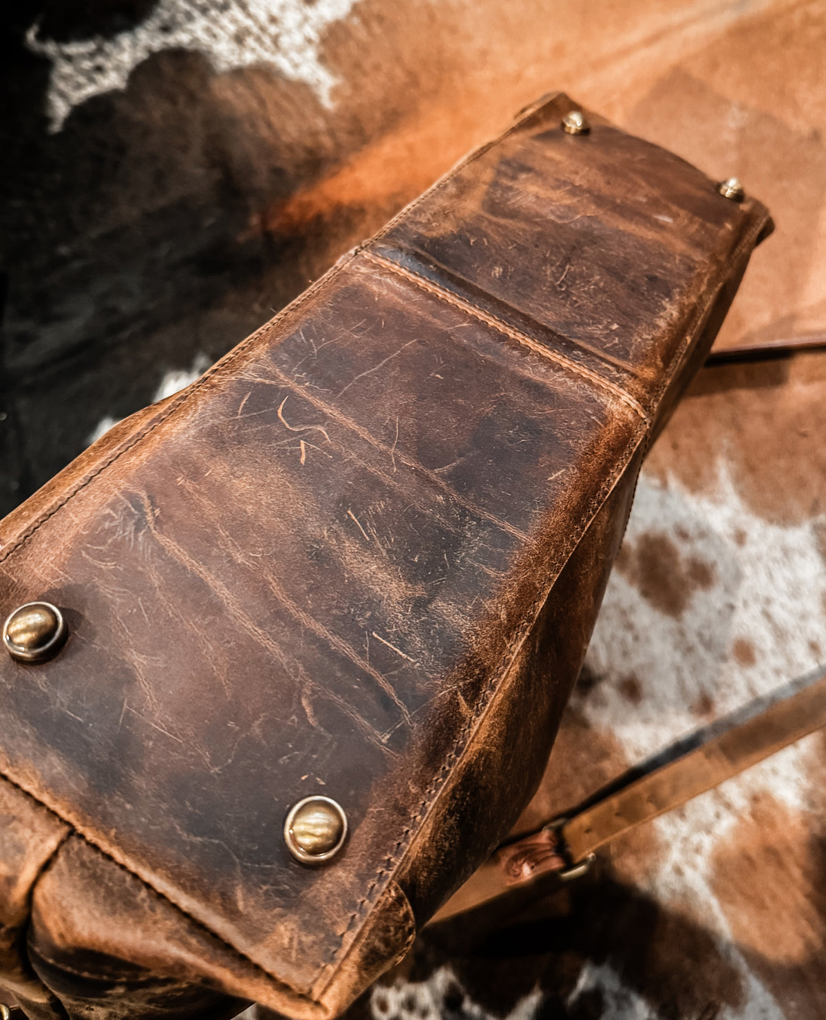 Tooled buckstitch leather purse