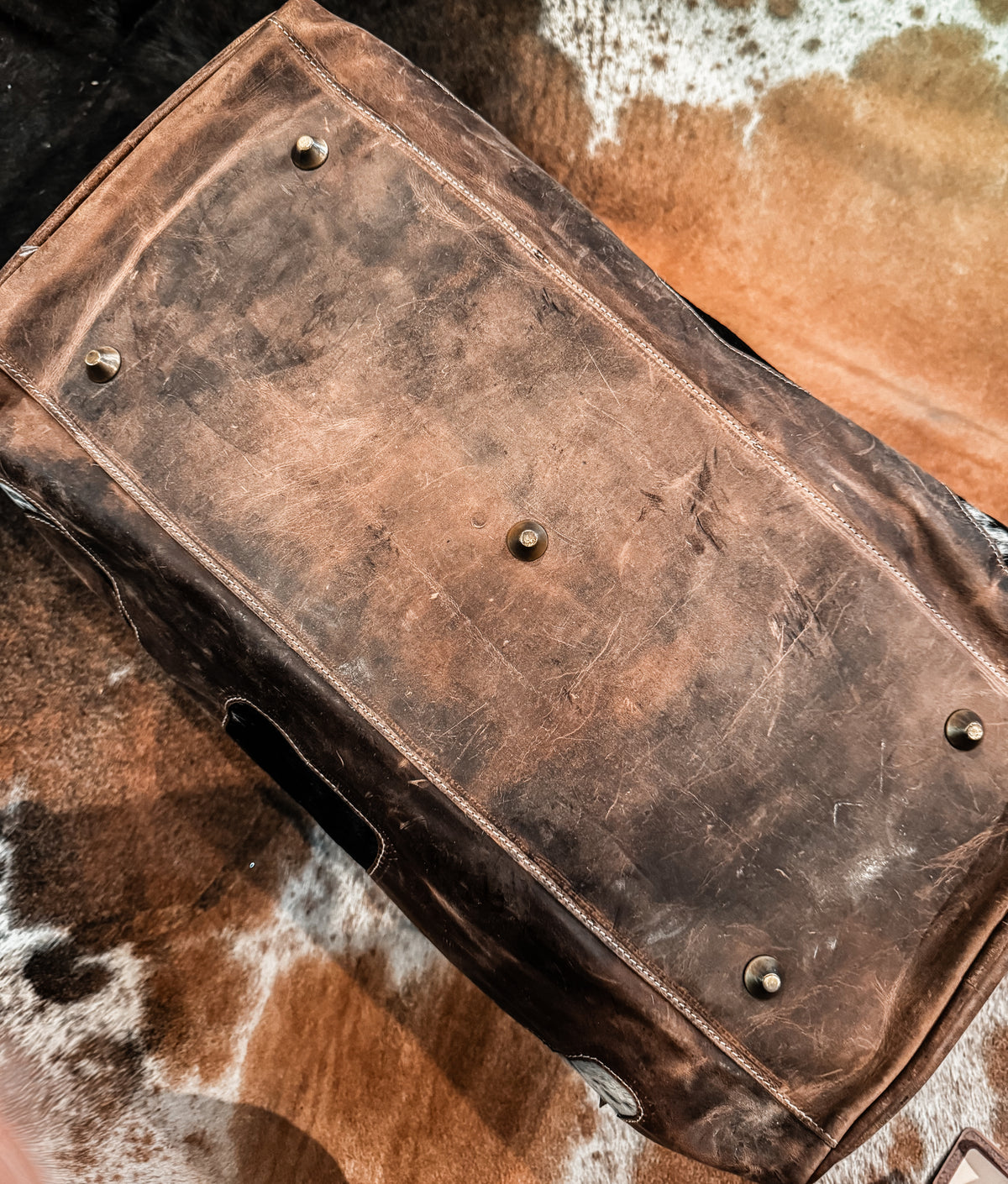 Cactus, cow tag, & horseshoe cowhide and leather duffel bag