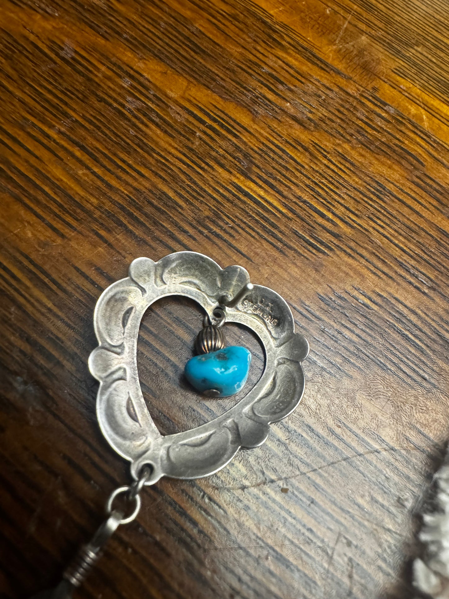 Q.T stamped hart earrings